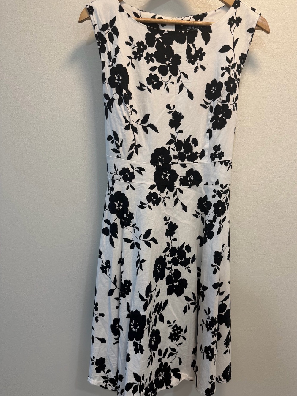 Sleeveless White Midi Dress with Black Floral Print